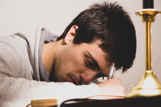 College student studying with yerba mate tea