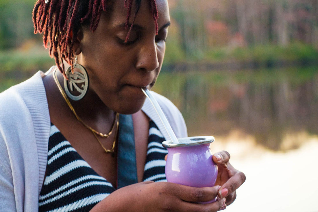 Girl drinking yerba mate tea