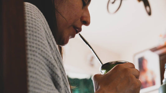 Girl sipping yerba mate