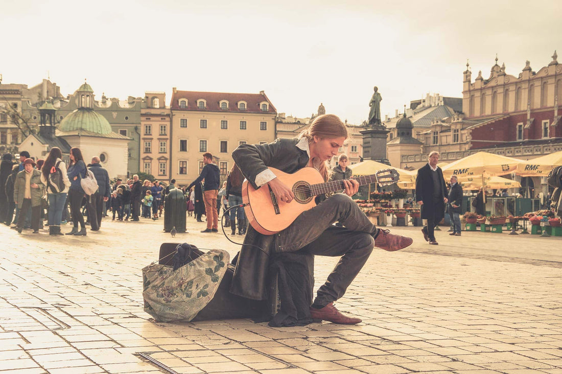 man playing guitar in poland